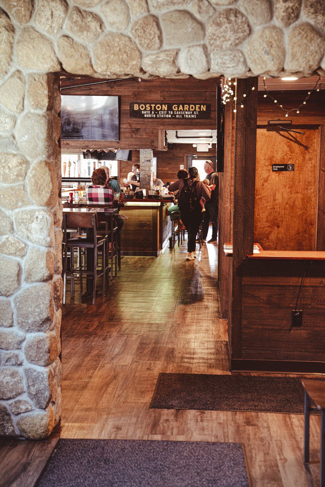 Looking through the stone arch into the bar